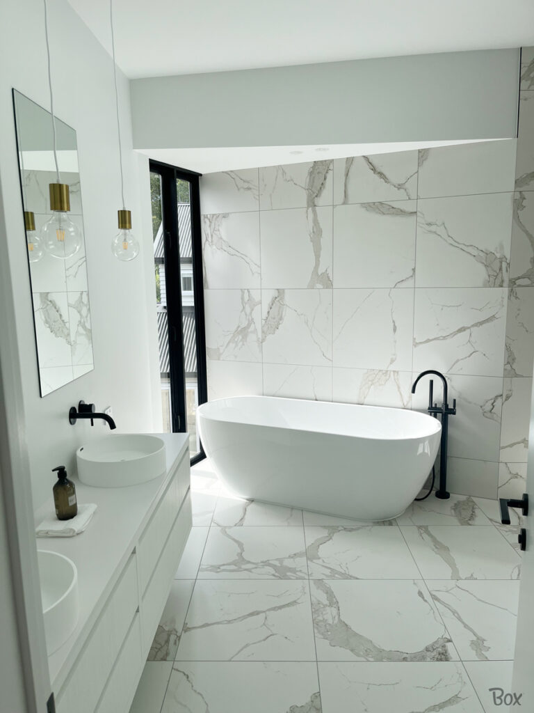 Large marble design tiles create a sense of luxury